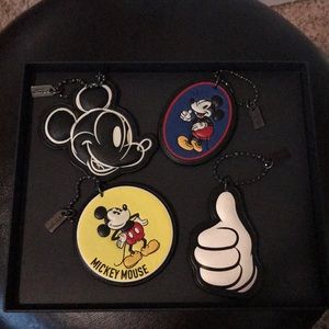 New Coach Disney set of 4 key chains bag tags